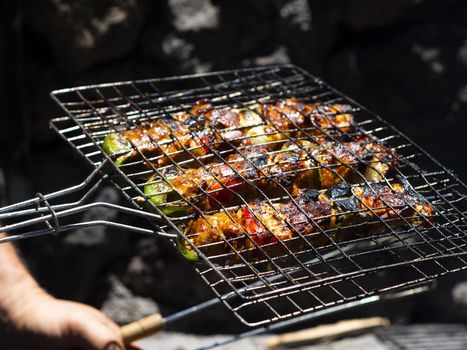 chef roasting vegetables grill