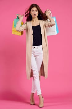 cheerful woman multicolored packs emotions shopping fashion isolated background. High quality photo