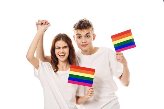 young couple lgbt Flag transgender lifestyle light background. High quality photo