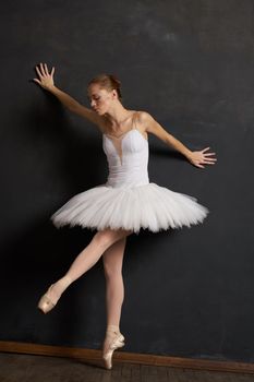 ballerina dance classic performance the dark background. High quality photo