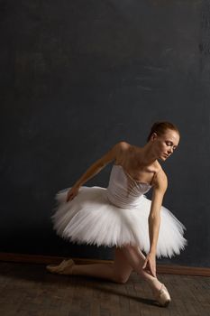 woman ballerina in white tutu performance grace dance. High quality photo