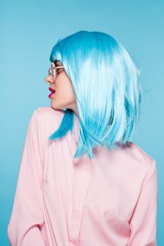 beautiful woman in blue wig sunglasses Glamor fashion. High quality photo