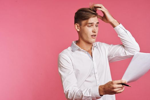 portrait of a man with a phone in hand fashion posing isolated background. High quality photo