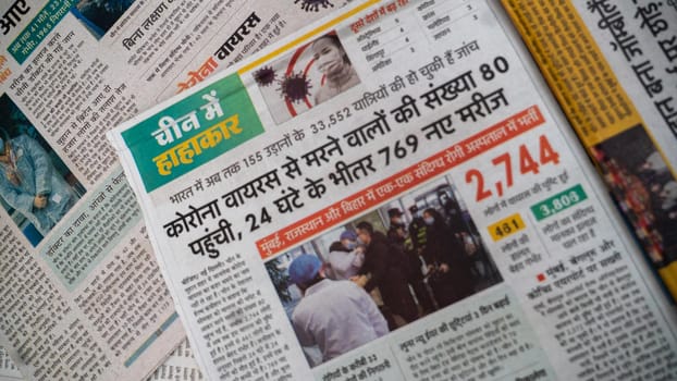 Dehradun, Uttarakhand India June 28, 2021. Hindi, Coronavirus COVID-19 News Headline in Newspaper of India. Headlines of the month March, April 2020.