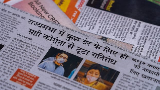 Dehradun, Uttarakhand India June 28, 2021. Hindi, Coronavirus COVID-19 News Headline in Newspaper of India. Headlines of the month March, April 2020.