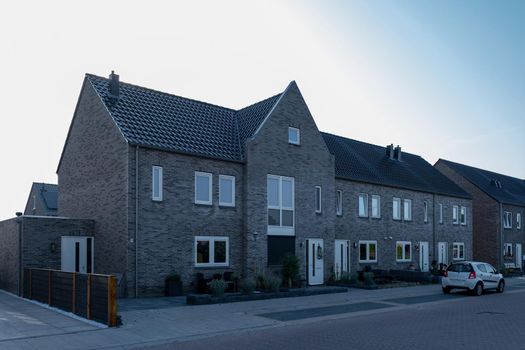 Dutch Suburban area with modern family houses, newly build modern family homes in the Netherlands, dutch family house, apartment house. Netherlands