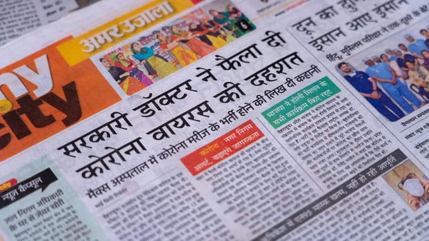 Dehradun, Uttarakhand India June 28, 2021. Hindi, Coronavirus COVID-19 News Headline in Newspaper of India. Headlines of the month March, April 2020.