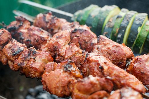 Traditional grilling meat outdoors, kebab, barbecue vegetable