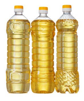 Set of sunflower oil in plastic bottle isolated on white background, close up.