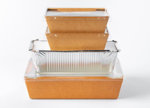 Assortment of food delivery containers on white background close up