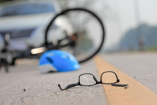 Accident car crash with bicycle on road