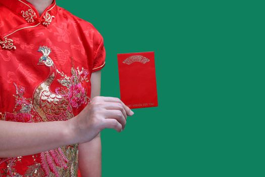 chinese woman holding new year red envelope or hong bao , text mean best whishes for you.
