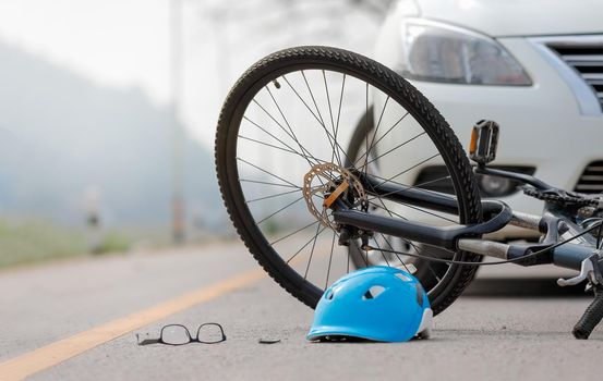 Accident car crash with bicycle on road