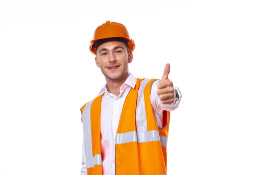 man in working orange uniform construction work. High quality photo