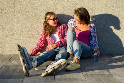 People, motherhood, family, summer and the concept of adoption - Happy mother and daughter talking outdoors