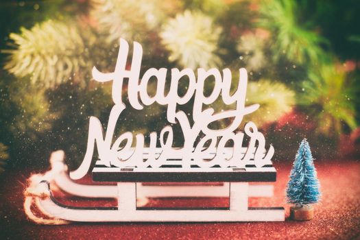 Christmas tree branches with snow and paper card note. Flat lay. Nature New Year concept.