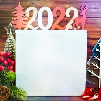 Wooden table decorated with Christmas gifts. Background with copy space mockup. Merry Christmas and happy new year.