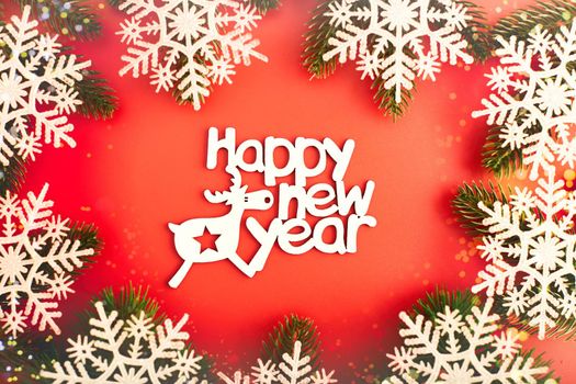 Sparkle bokeh lights on red canvas background. Merry christmas card. Winter holiday theme. Happy New Year.