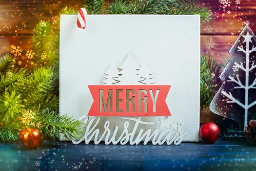 Merry christmas card. Christmas background with xmas tree and sparkle bokeh lights