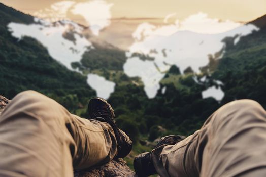 Double exposure of pov image male legs outdoor and map of world, concept of travel.