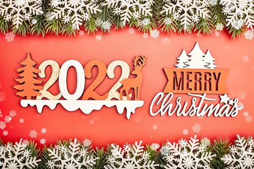 Sparkle bokeh lights on red canvas background. Merry christmas card. Winter holiday theme. Happy New Year.