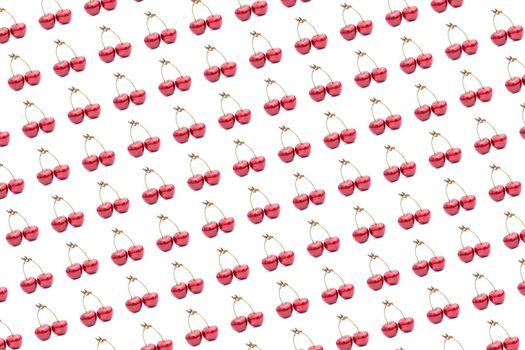 Two cherries berry pattern isolated on a white background. Ripe, tasty red cherries on a white background close up - summer fruits and berries concept. Flat lay.