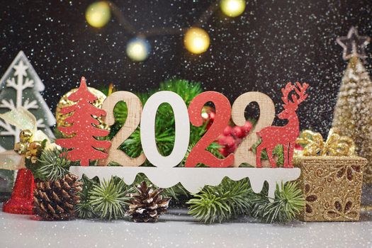 Christmas or New Year dark background, Xmas black board framed with season decorations, space for a text