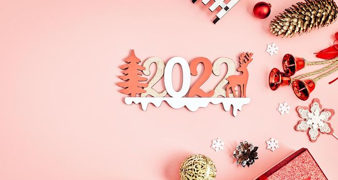 Happy New Year holiday concept. New Year decorations,  tree, snowflake, pine cone, gifts on  background. Holiday party greeting card mockup with copy space. Flat lay, top view, overhead.