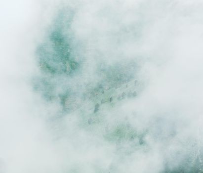 Dense mist over a mountain valley.