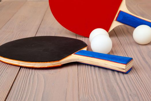 Ping pong equipment on wooden table