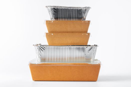Assortment of food delivery containers on white background close up