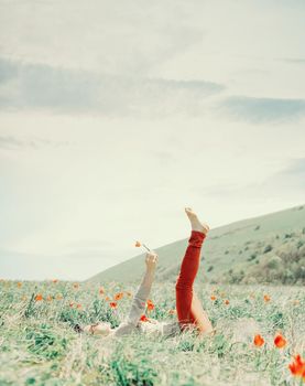 Young woman relaxing on wildflower meadow.