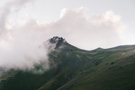 Cloudscape over summer mountain, nature background.