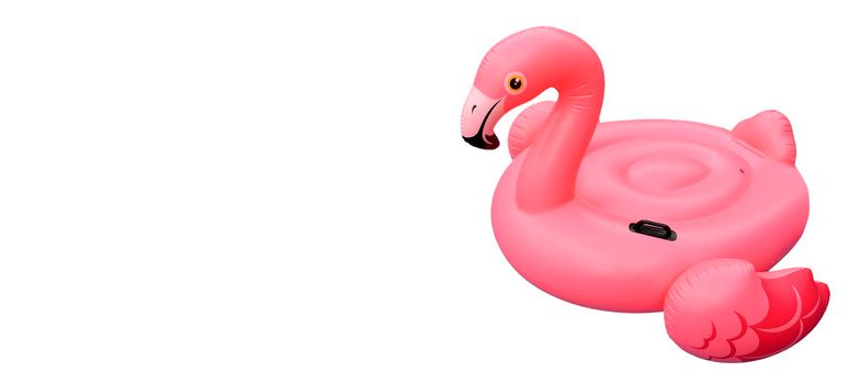 Swimming pool toy in shape of pink flamingo isolated on white. Flamingo inflatable cut out on white