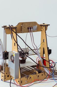 Electronic printer during work in school laboratory, 3D printer, 3D printing. Study and technologies