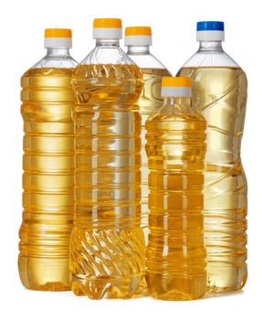Set of sunflower oil in plastic bottle isolated on white background, close up.