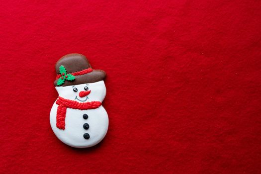 Christmas decoration mock up or flatlay with snowman over red background. Eco natural frame. winter, New Year Holidays concept as top view, copyspace. greeting card template.