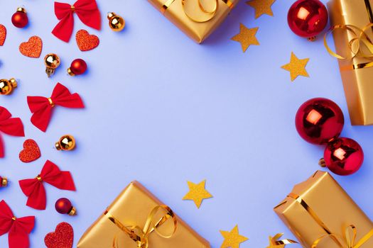 Winter festive background with hearts, bows and baubles, copy space
