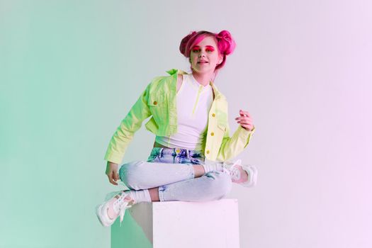 cheerful woman green jacket fashionable clothes studio model. High quality photo