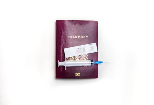 International biometric COVID-19 vaccination passport, syringe and Covid-19 negative test, traveling in pandemic worlwide concept on white background top view, copy space business