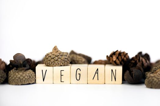 Vegan concept and veganism lifestyle, Vegan text on white background eating green biological natural food with copy space closeup