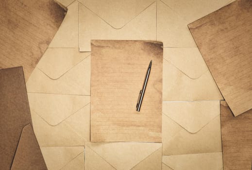 Vintage old brown envelope and paper background texture top view, Flat lay copy space, business, education, antique, rustic concept retro design space for text