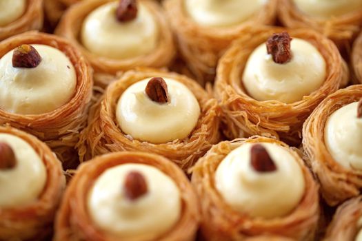 Turkish baklava dessert with honey, close up photo