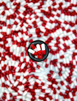 Capsule pills medication,Vitamin,antibiotic pharmaceutical background top view, colorful white and red,Business,Health,industrial concept tablets
