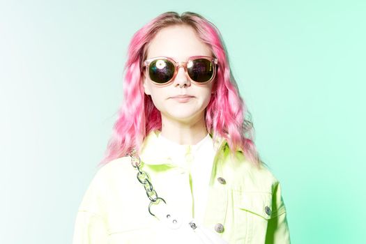 cheerful woman with bright makeup pink hair Glamor posing fun. High quality photo