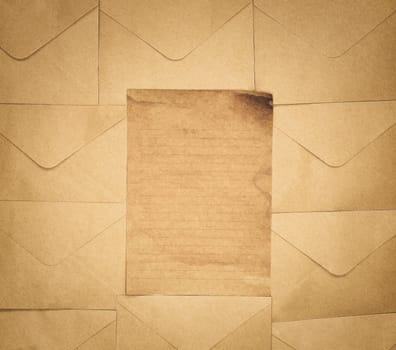 Vintage old brown envelope and paper background texture top view, Flat lay copy space, business, education, antique, rustic concept retro design space for text