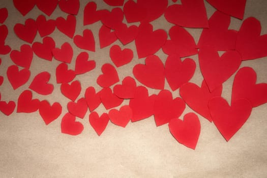 Various romantic red hearts, symbol for Valentine's day, with paper plain background, romantic Valentine design. copy space beauty
