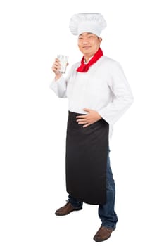 chef holding glass cup and drink yogurt or milk nice photo