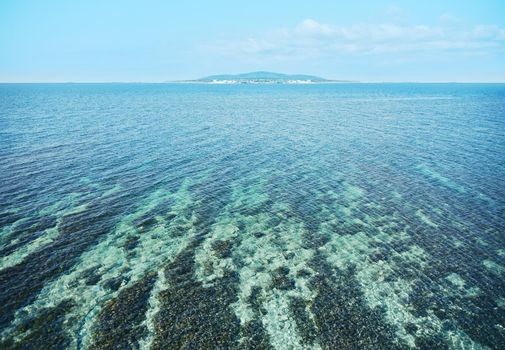 Beautiful green island in the blue ocean