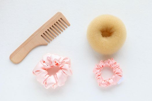 wooden Hairbrush, barrette and silk Pink Scrunchy isolated on white. Flat lay Hairdressing tools and accessoriesas Color Hair Scrunchies, Elastic Hair Bands, Bobble Sports Scrunchie Hairband